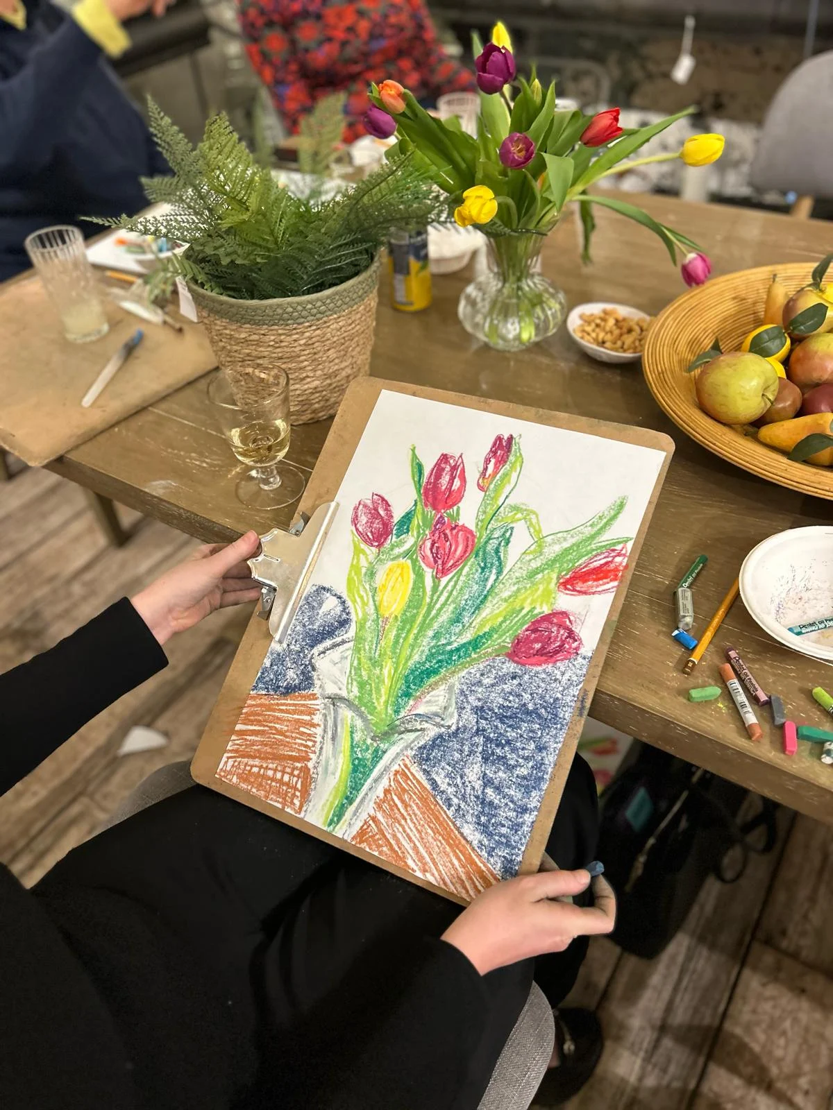 Colourful pastel tulips drawn at a workshop